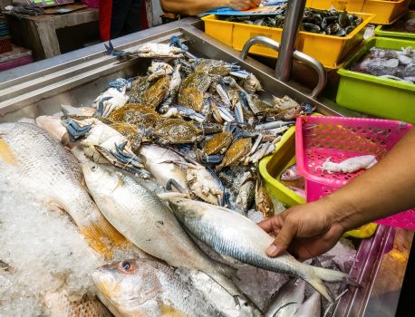 Melaka, Malaysia - Aug 25, 2022  Fresh seafood restaurant selling cook to order dishes operating at night.